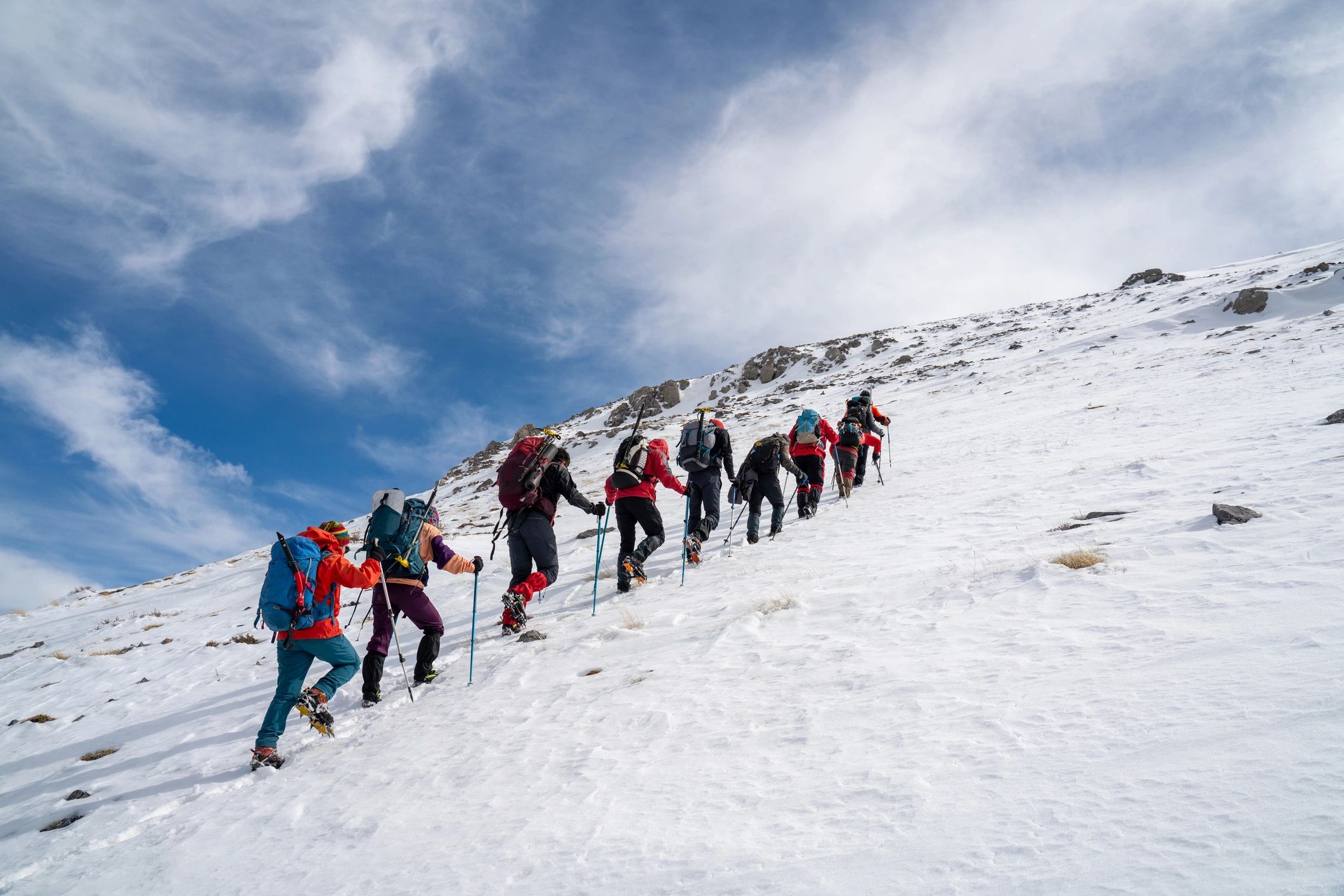 Group hiking adventure in the mountains